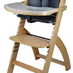 Abiie Beyond Wooden Trona con bandeja para bebé, el asiento perfecto que funciona como trona para niños pequeños (a partir de 6 meses) o como silla de comedor (madera al natural - cojín negro)