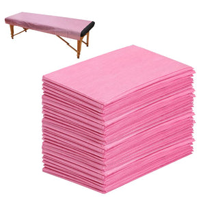 50 sábanas de mesa de masaje, desechables, no tejidas, para cama de spa, tela de polipropileno transpirable, 31 x 70 pulgadas, finas, no impermeables (rosa)